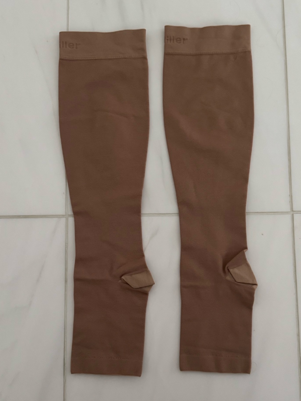 Doc Miller Beige Open-Toe Compression Stockings.